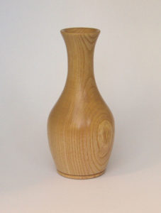 an artisan in wood - ash vase